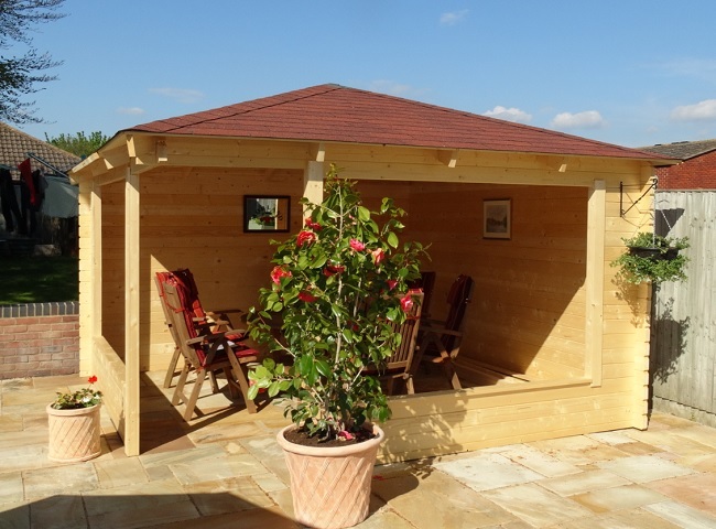 Marit wooden gazebo erected within a back garden in Oxfordshire